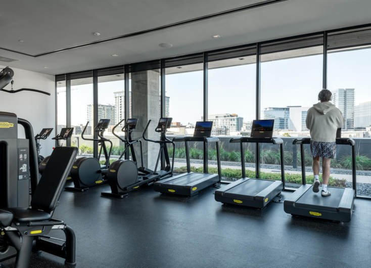 State-of-the-art fitness center at 805 Lea, a luxury apartment building in downtown Nashville, offering modern equipment and stunning city views.